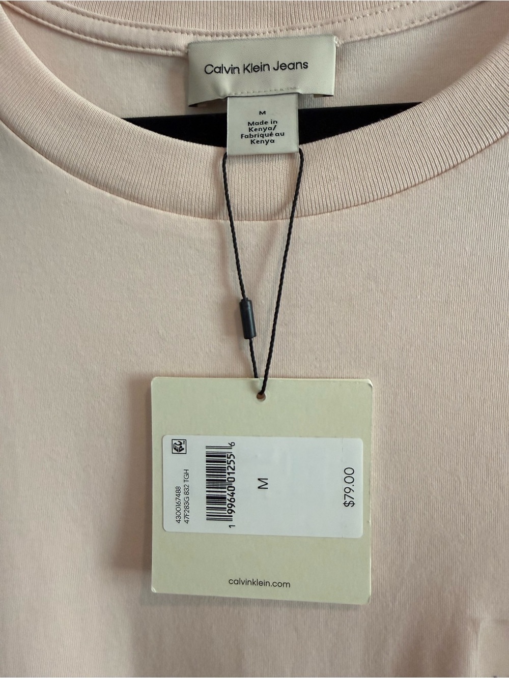 Calvin Klein Women’s Light Pink Crew Neck T-Shirt with pockets - Picture 2 of 4
